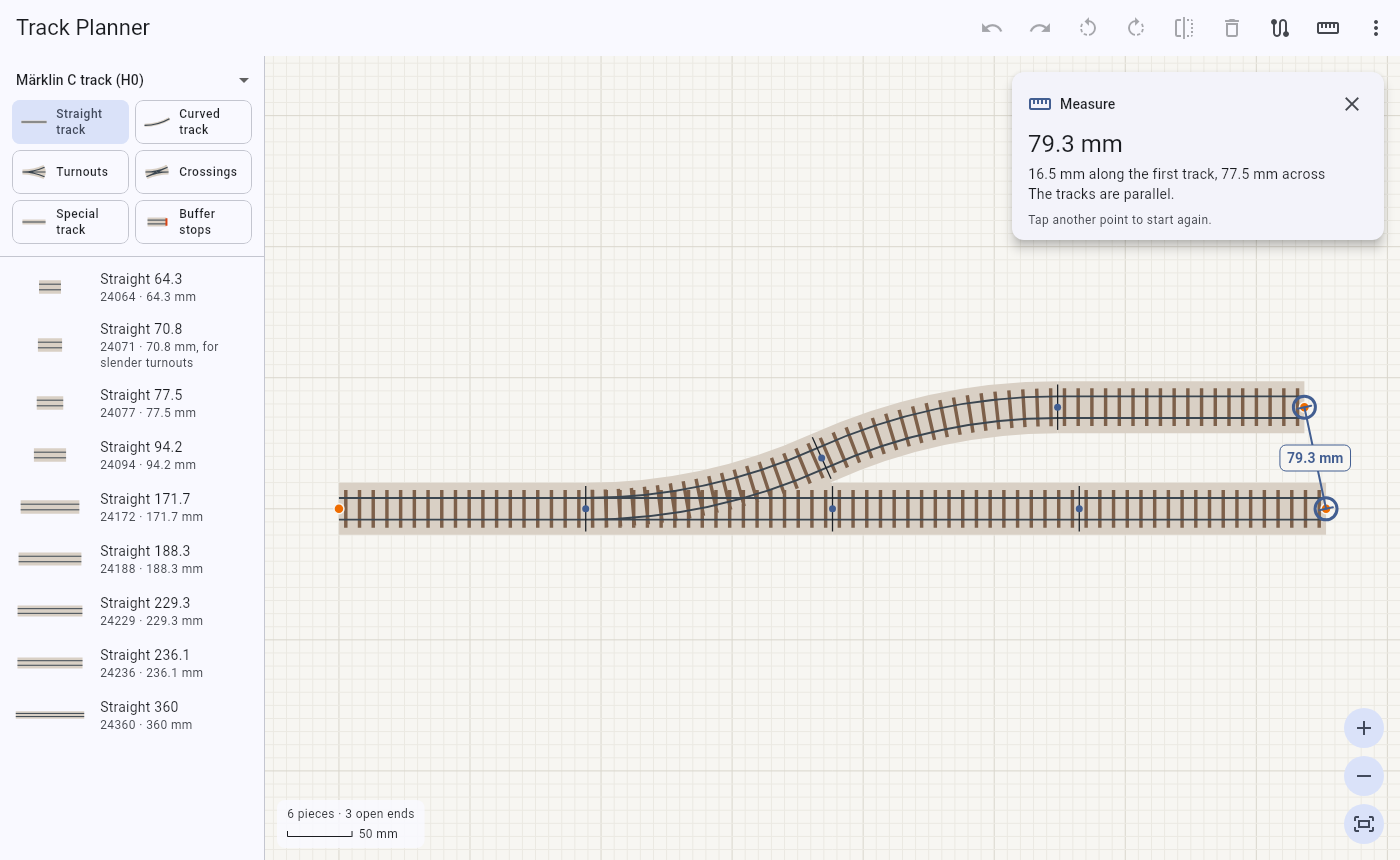 The distance measured between the ends of two tracks